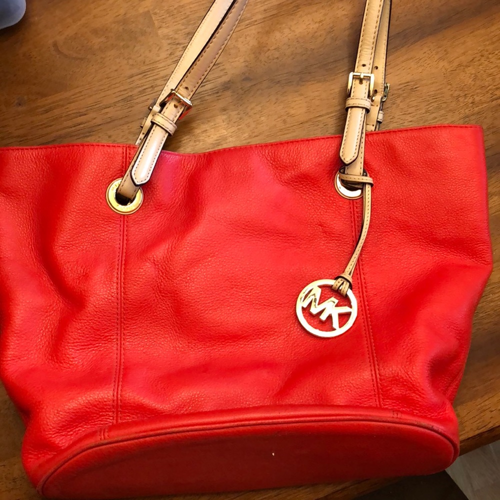 Michael Kors orange handbag/tote